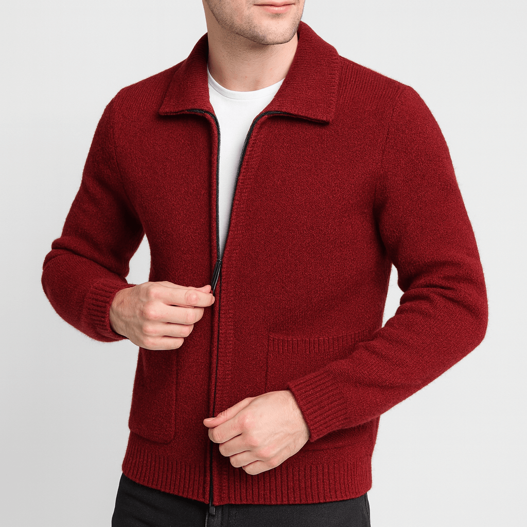 Red knitted cardigan worn by a person on a light gray background